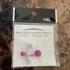 One purple and one white glitter belly button ring